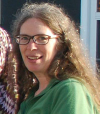 Kathy Cosenza smiles during a Crab Lab party.